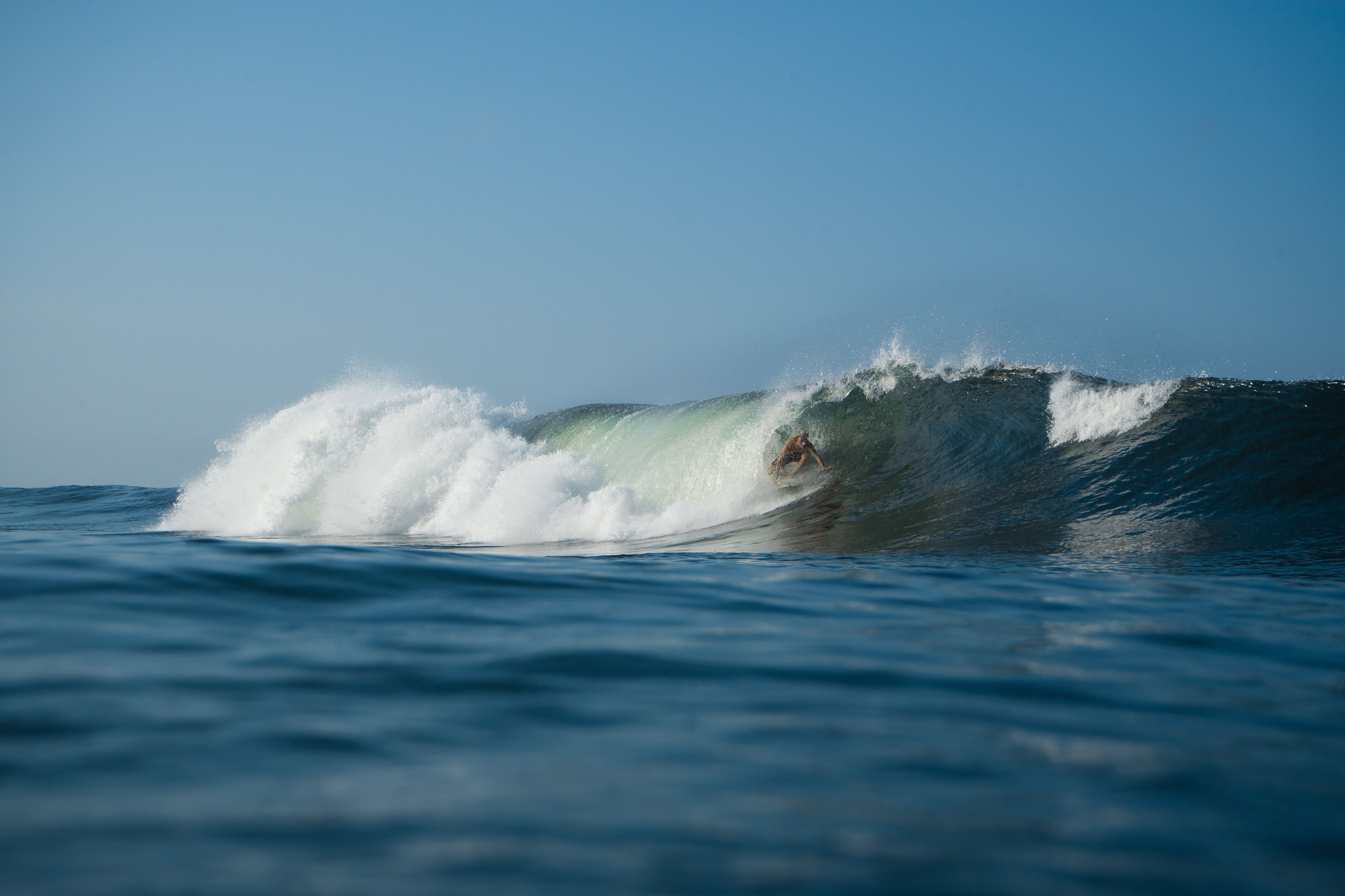 Surf instructor with student at El Zonte
